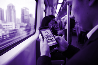 person using a cell phone to catch a quick learning break